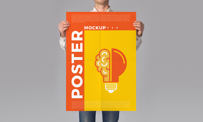 Man-Holding-Poster-Mockup-PSD-2018-300