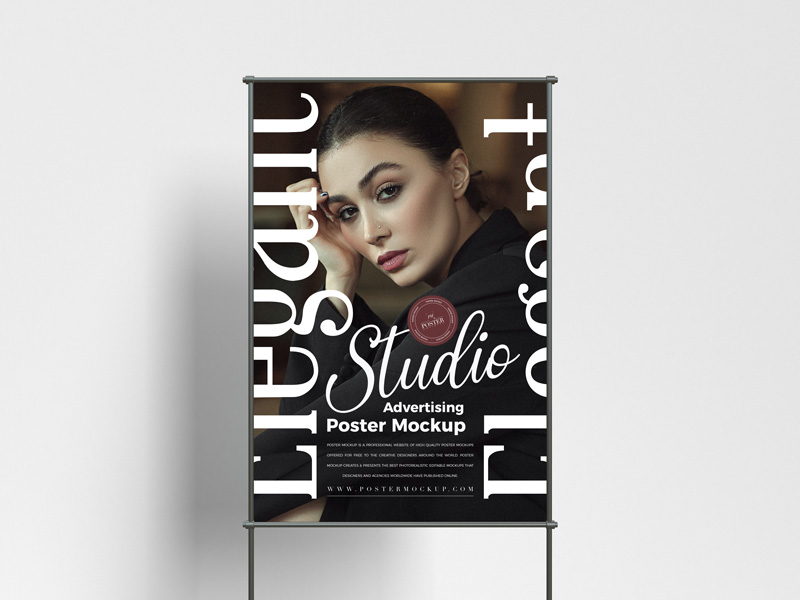 Free-Studio-Framed-Advertising-Poster-Mockup