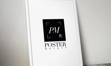 Free-Poster-Frame-on-Wooden-Background-MockUp-PSD-2018